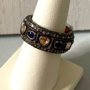 Gold and silver gemstone eternity band ring